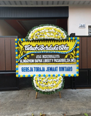 Papan Bunga Duka di Bende